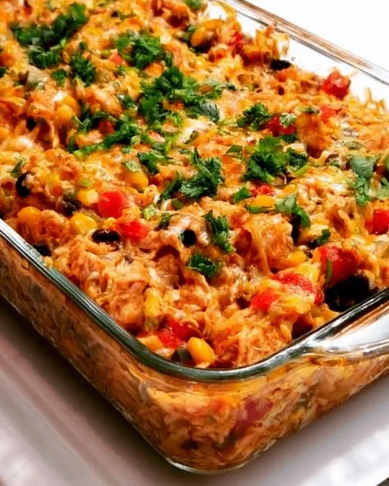 Delicious Chicken Burrito Casserole with colorful toppings and cheese